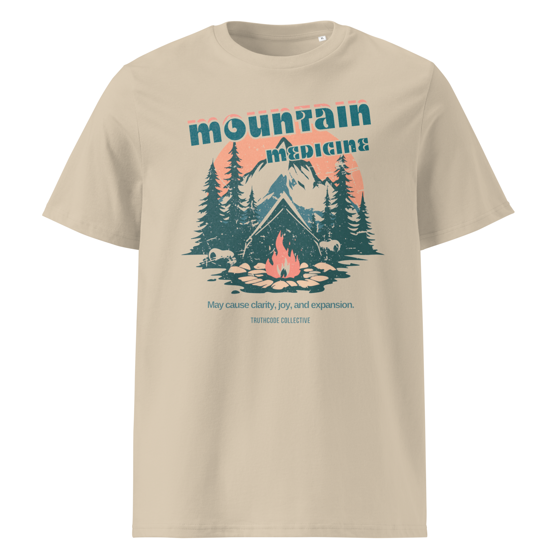 Beige organic t-shirt with mountain and campfire graphic and 'Mountain Medicine' text on a white background
