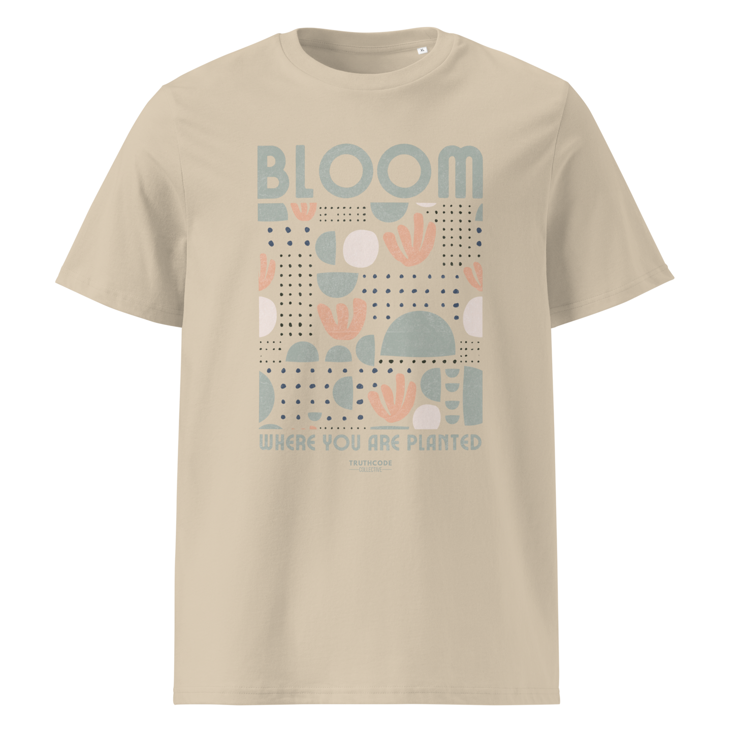 Beige organic t-shirt with 'Bloom Where You Are Planted' design on a white background