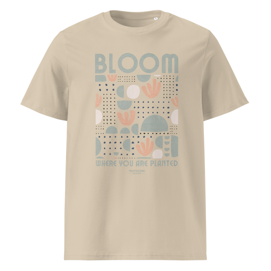Beige organic t-shirt with 'Bloom Where You Are Planted' design on a white background