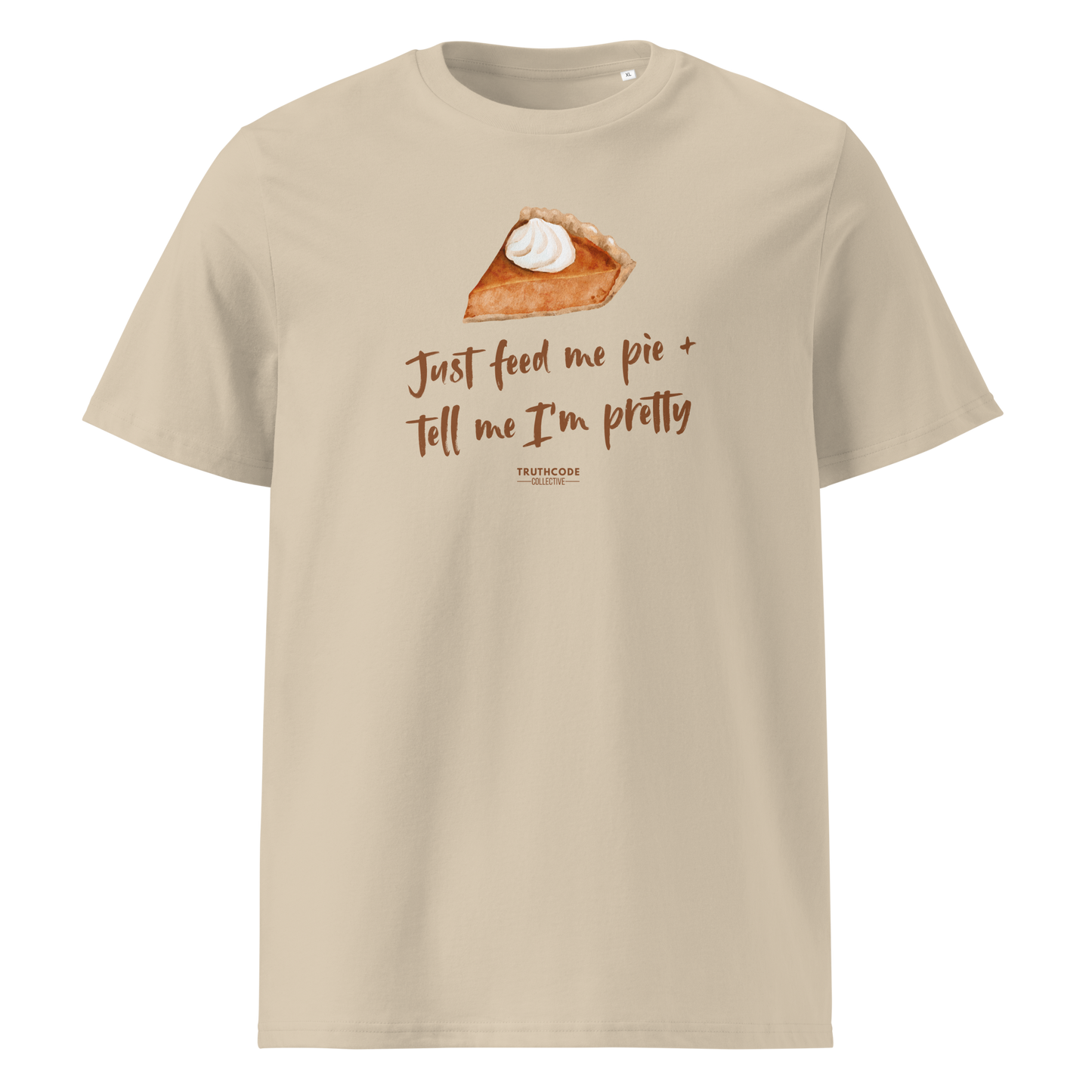 Beige organic t-shirt with a pie graphic and text 'Just feed me pie + tell me I'm pretty' on a white background