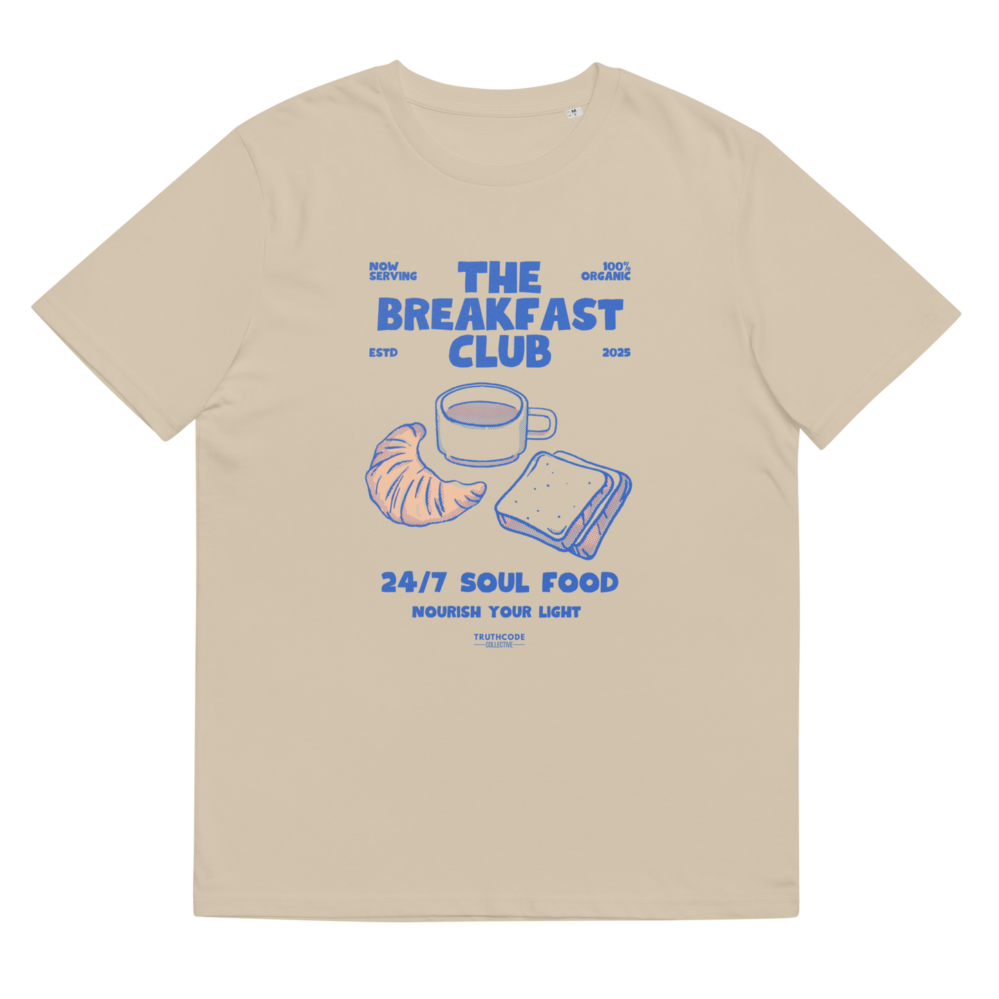 Beige organic t-shirt with 'The Breakfast Club' graphic design featuring a coffee cup, croissant, and sandwich.