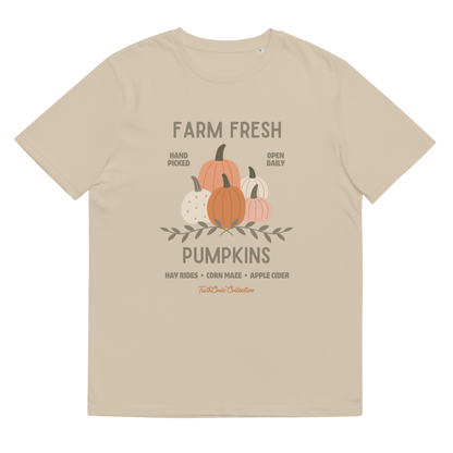 Beige organic t-shirt with pumpkin graphic and text 'Farm fresh pumpkins, hay rides, corn maze, apple cider'  on a white background