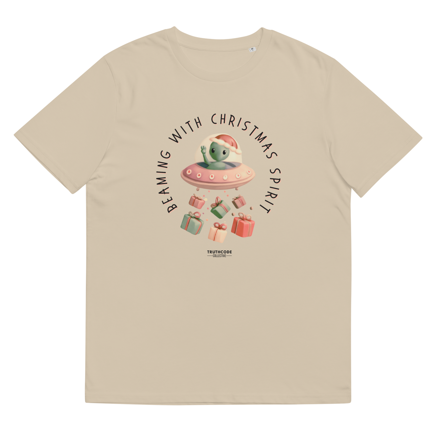 Beige organic t-shirt with cute alien in a spaceship Christmas-themed graphic and text 'Beaming with Christmas spirit'
