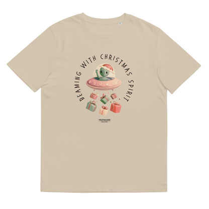 Beige organic t-shirt with cute alien in a spaceship Christmas-themed graphic and text 'Beaming with Christmas spirit'
