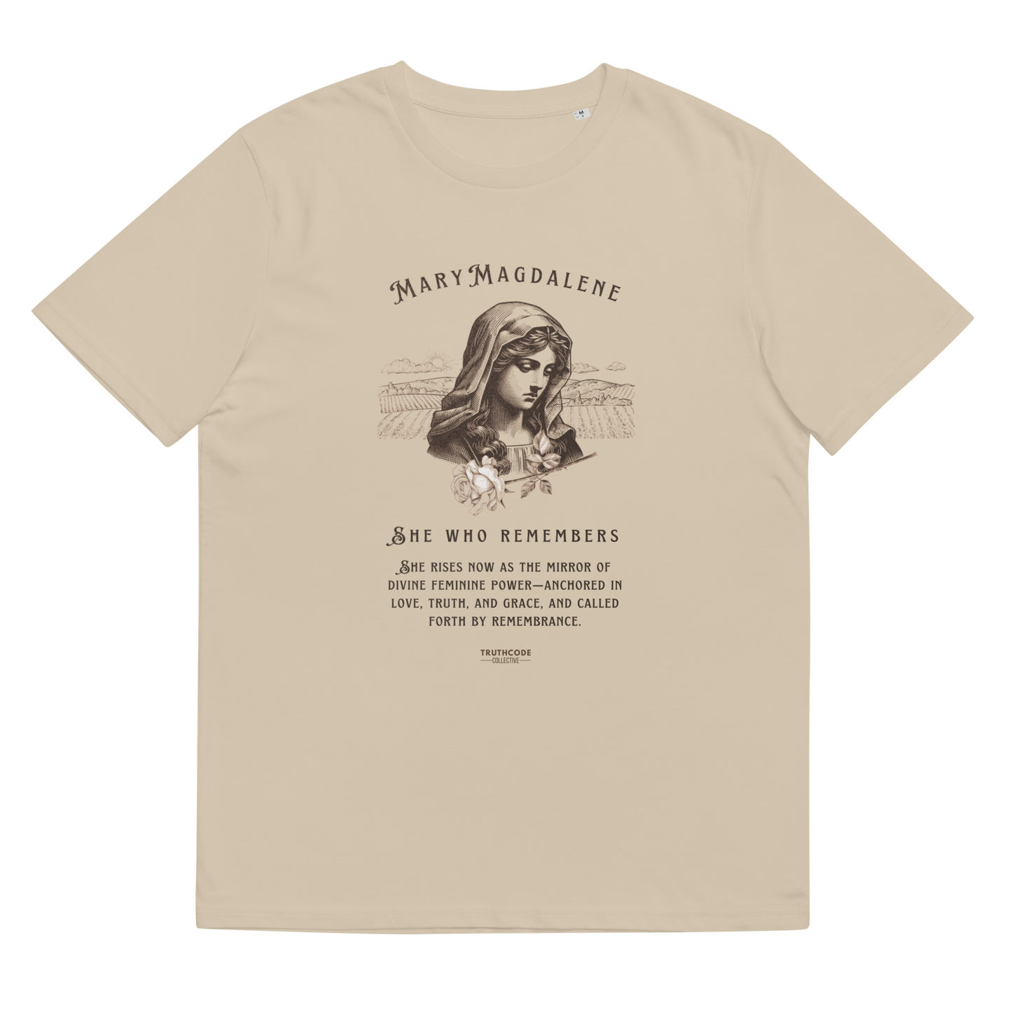 Beige organic t-shirt with a graphic of Mary Magdalene and text 'She who remembers, she rises now as the mirror of the divine feminine power...',  on a white background