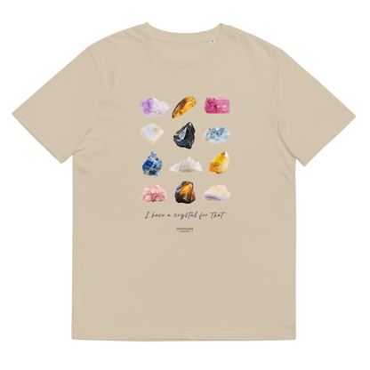 Beige organic t-shirt with colorful gemstone graphic and text 'I have a crystal for that' against a white background