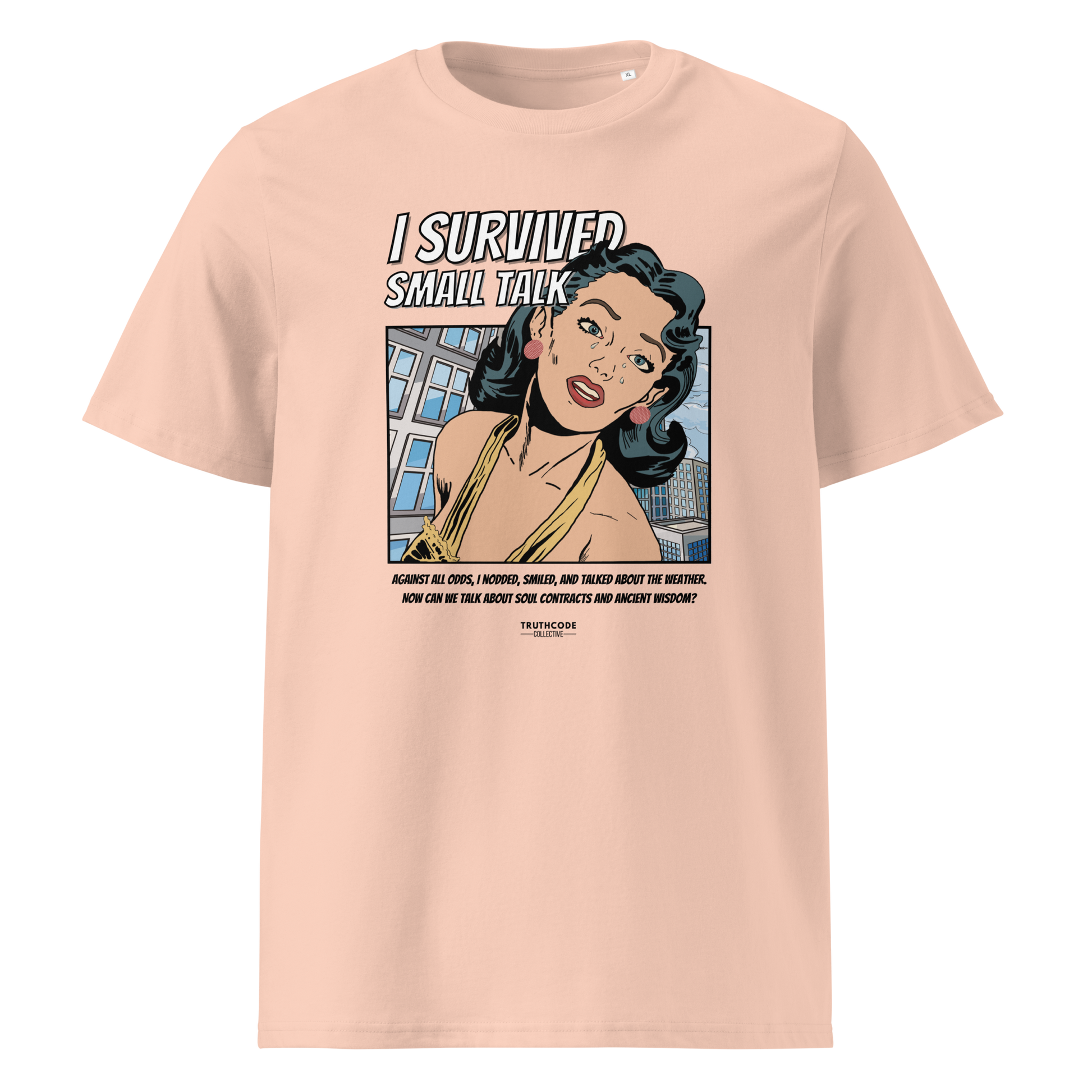 Peach organic t-shirt with a graphic design featuring a comic cartoon woman and text with lighthearted saying 'I SURVIVED SMALL TALK'
