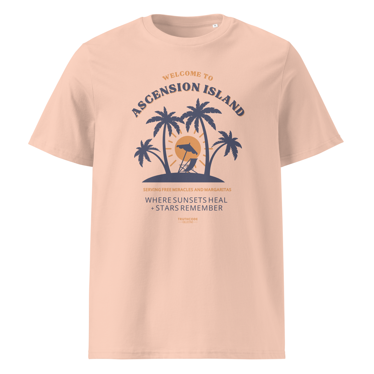 Peach organic t-shirt with palm tree design and text 'Ascension island, where sunsets heal + stars remember' on a white background