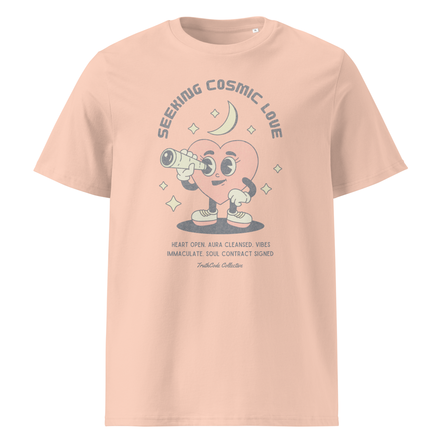 Peach organic t-shirt with a heart-shaped character holding a telescope and text 'Seeking Cosmic Love' on a white background.