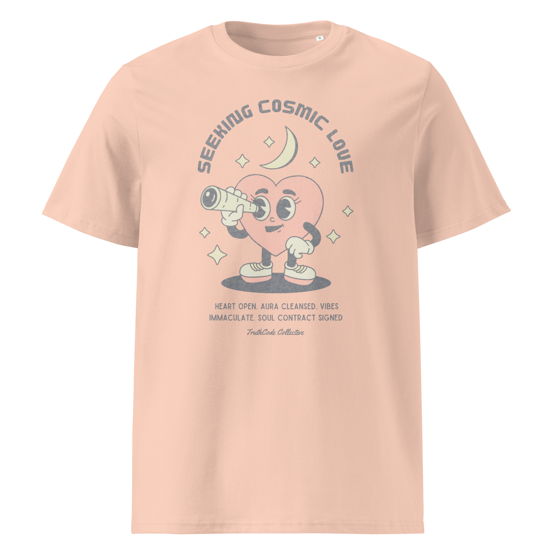 Peach organic t-shirt with a heart-shaped character holding a telescope and text 'Seeking Cosmic Love' on a white background.