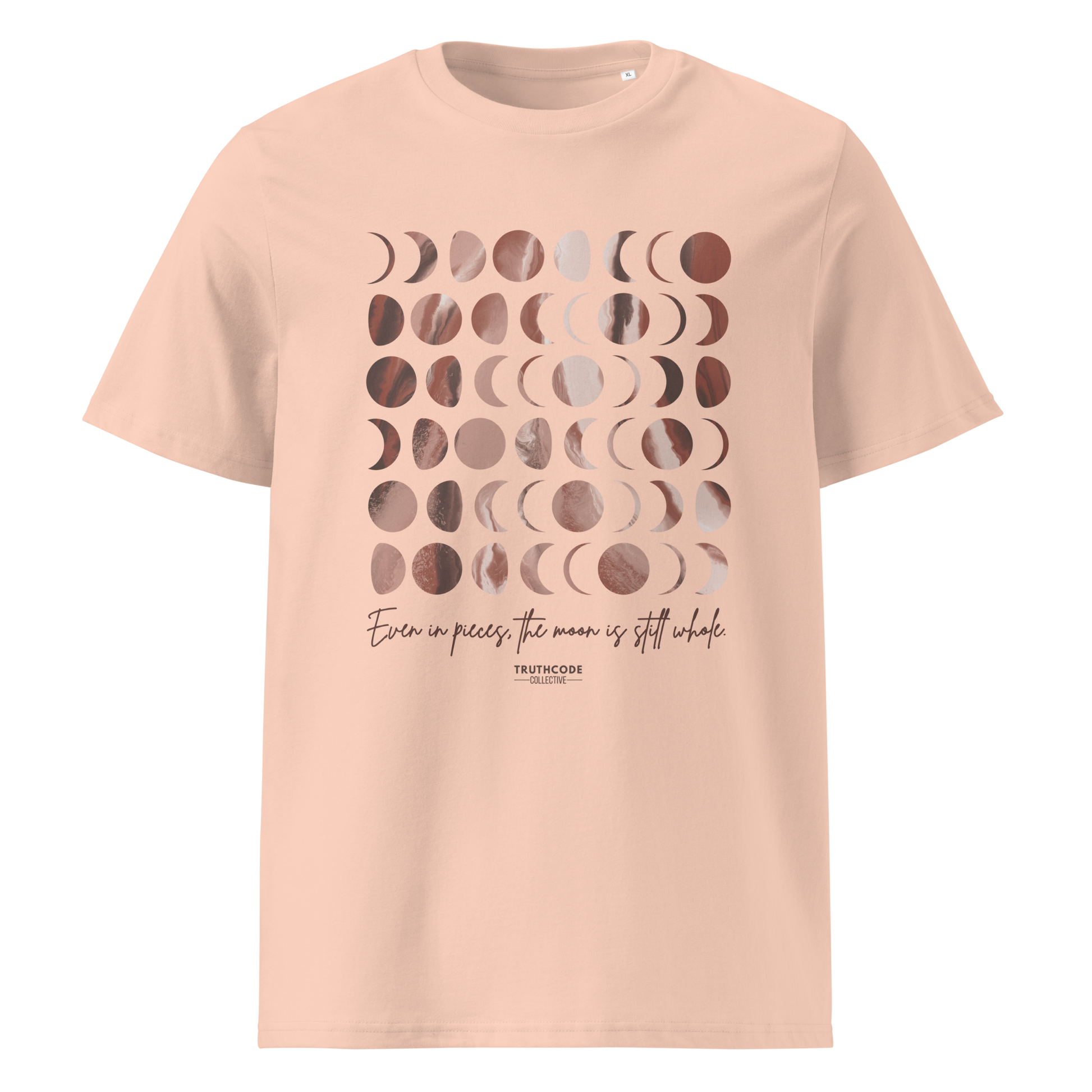 Peach organic t-shirt with rose gold moon phase design and text 'Even in pieces, the moon is still whole' on a white background