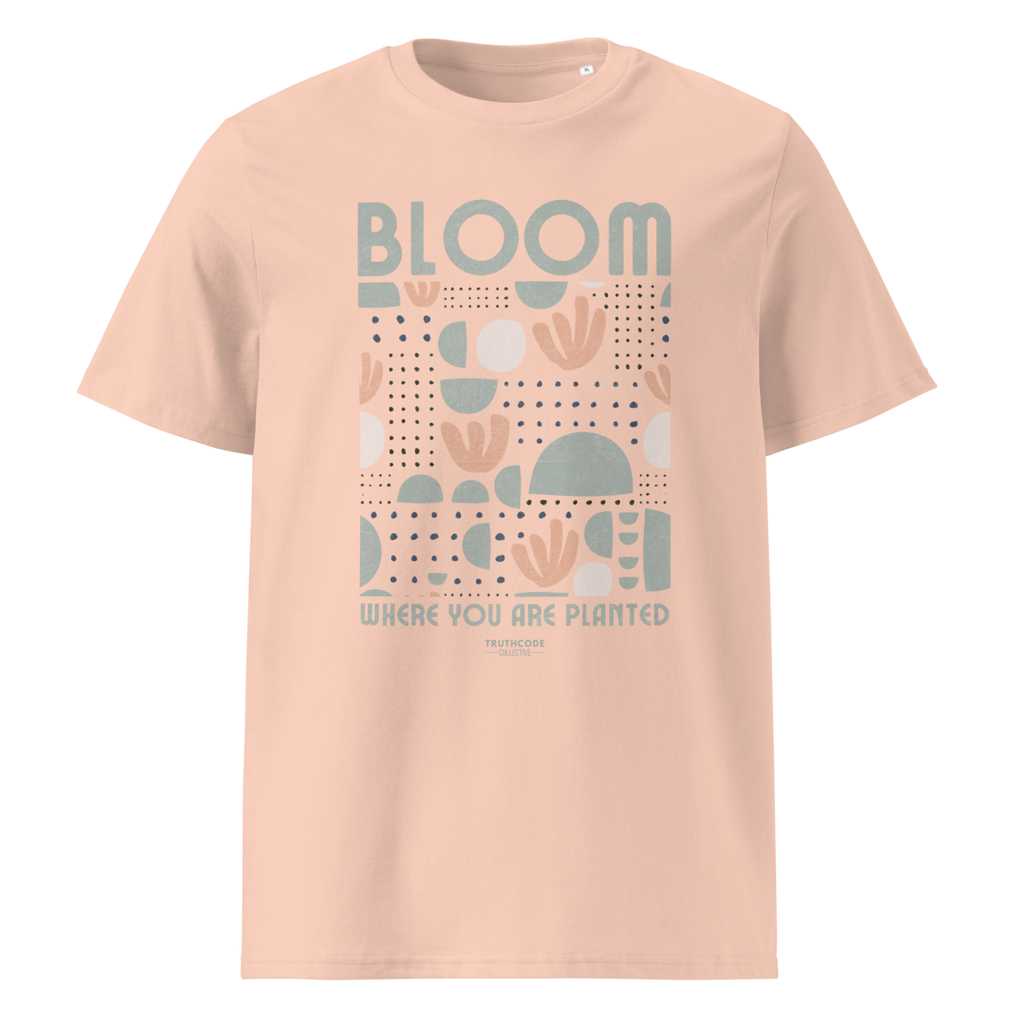 Peach organic t-shirt with 'Bloom Where You Are Planted' design on a white background