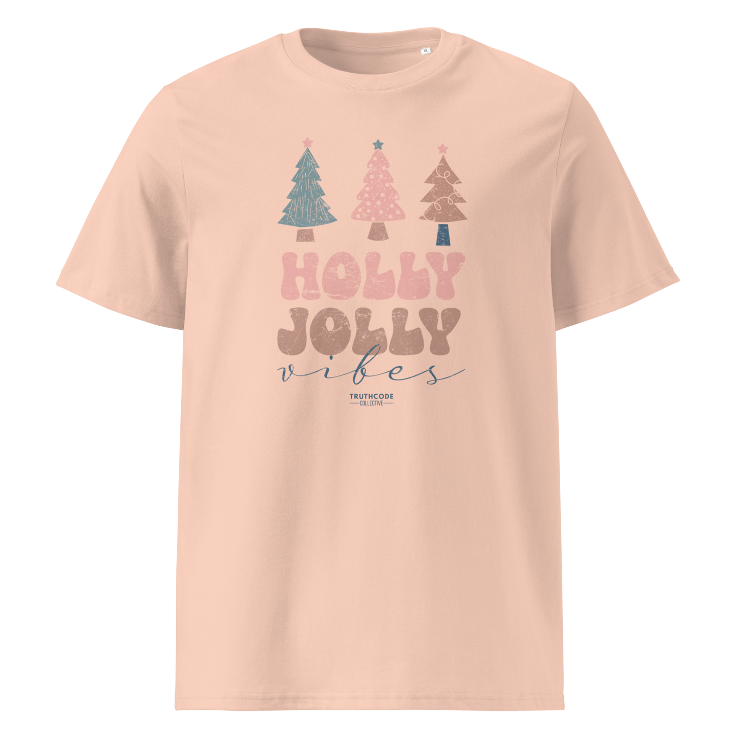 Peach organic t-shirt with Christmas tree design and 'Holly Jolly vibes' text on a white background