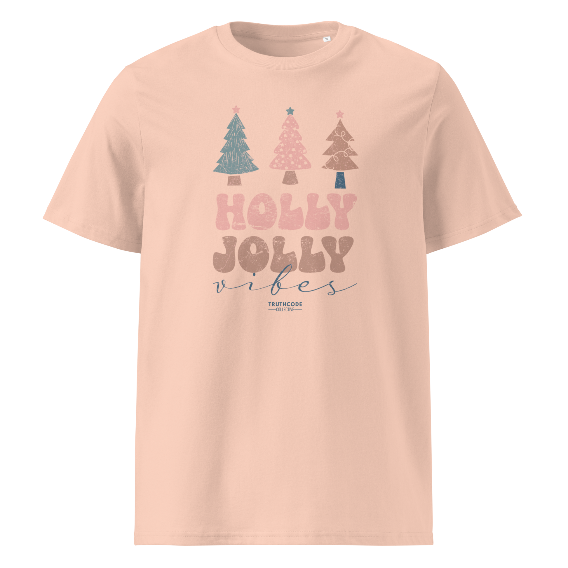 Peach organic t-shirt with Christmas tree design and 'Holly Jolly vibes' text on a white background
