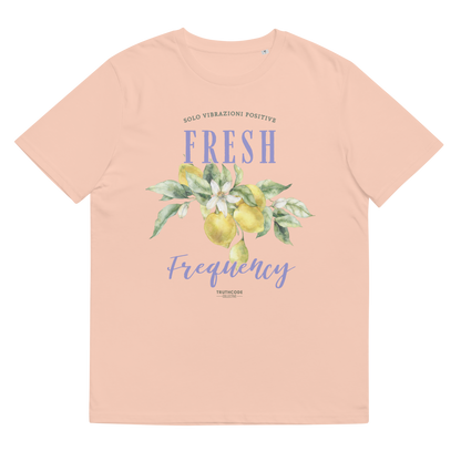 Peach organic t-shirt with lemon graphic and text 'Fresh frequency' on a white background
