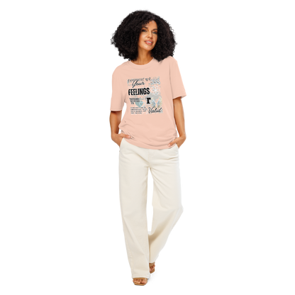 Woman wearing peach organic t-shirt with collage style  graphic design and text 'Your feelings R valid' on a white background