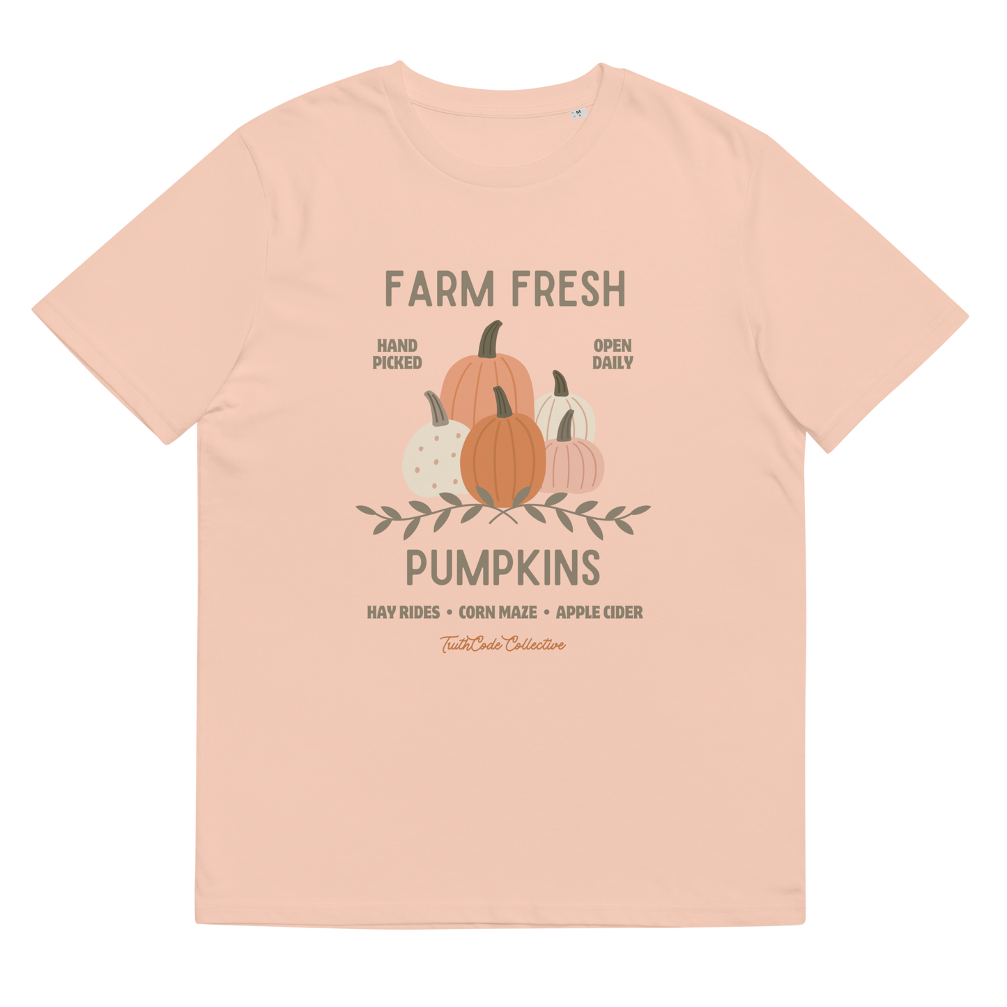 Peach organic t-shirt with pumpkin graphic and text 'Farm fresh pumpkins, hay rides, corn maze, apple cider'  on a white background