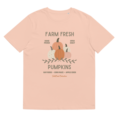 Peach organic t-shirt with pumpkin graphic and text 'Farm fresh pumpkins, hay rides, corn maze, apple cider'  on a white background