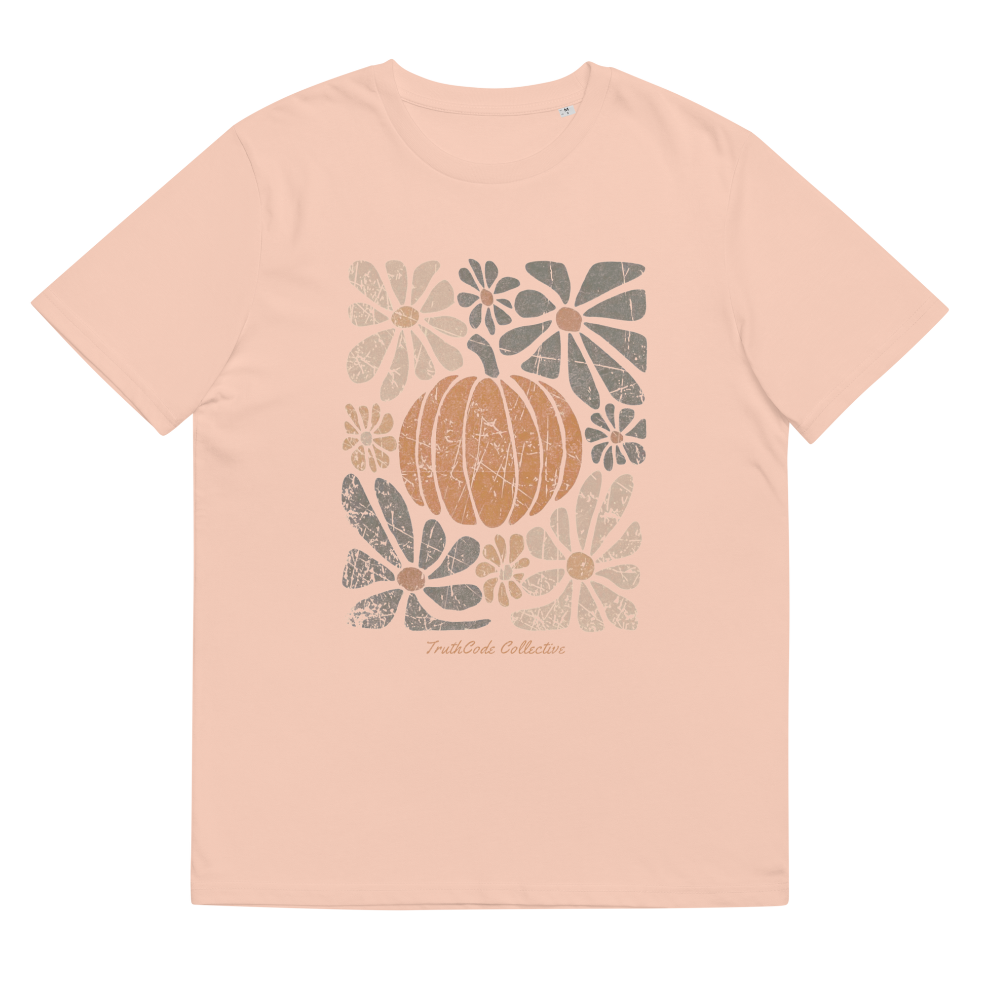 Peach organic t-shirt with a pumpkin and floral design on a white background