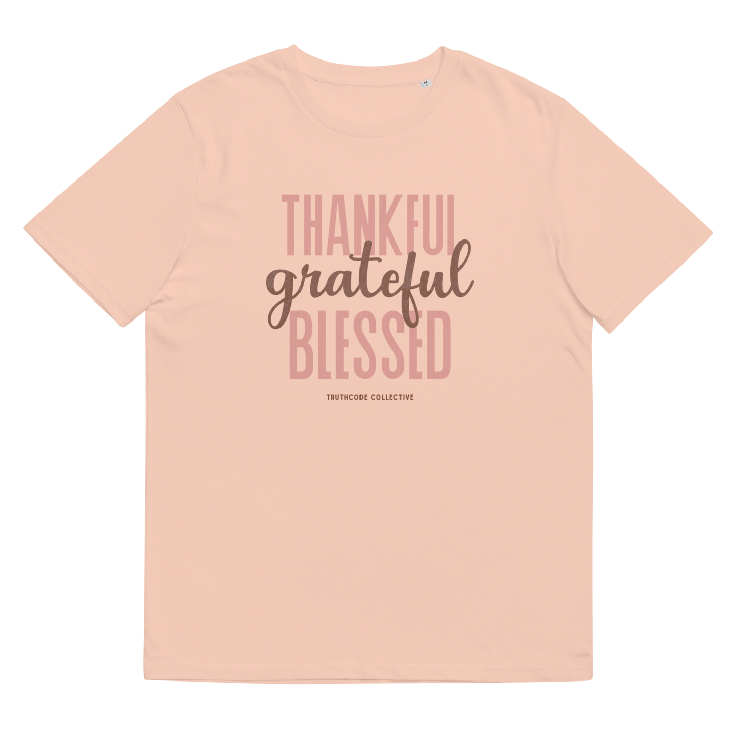 Peach organic t-shirt with 'Thankful grateful BLESSED' text design on a white background