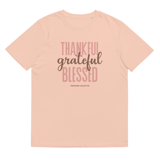 Peach organic t-shirt with 'Thankful grateful BLESSED' text design on a white background
