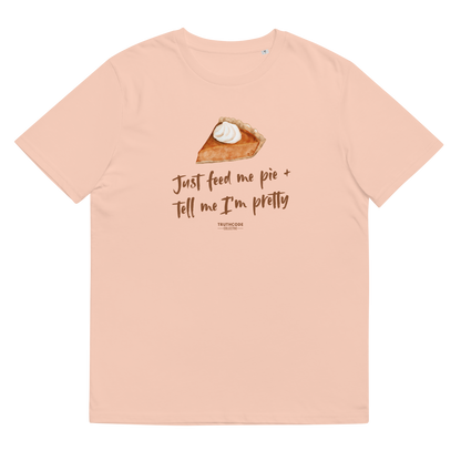 Peach organic t-shirt with a pie graphic and text 'Just feed me pie + tell me I'm pretty'
