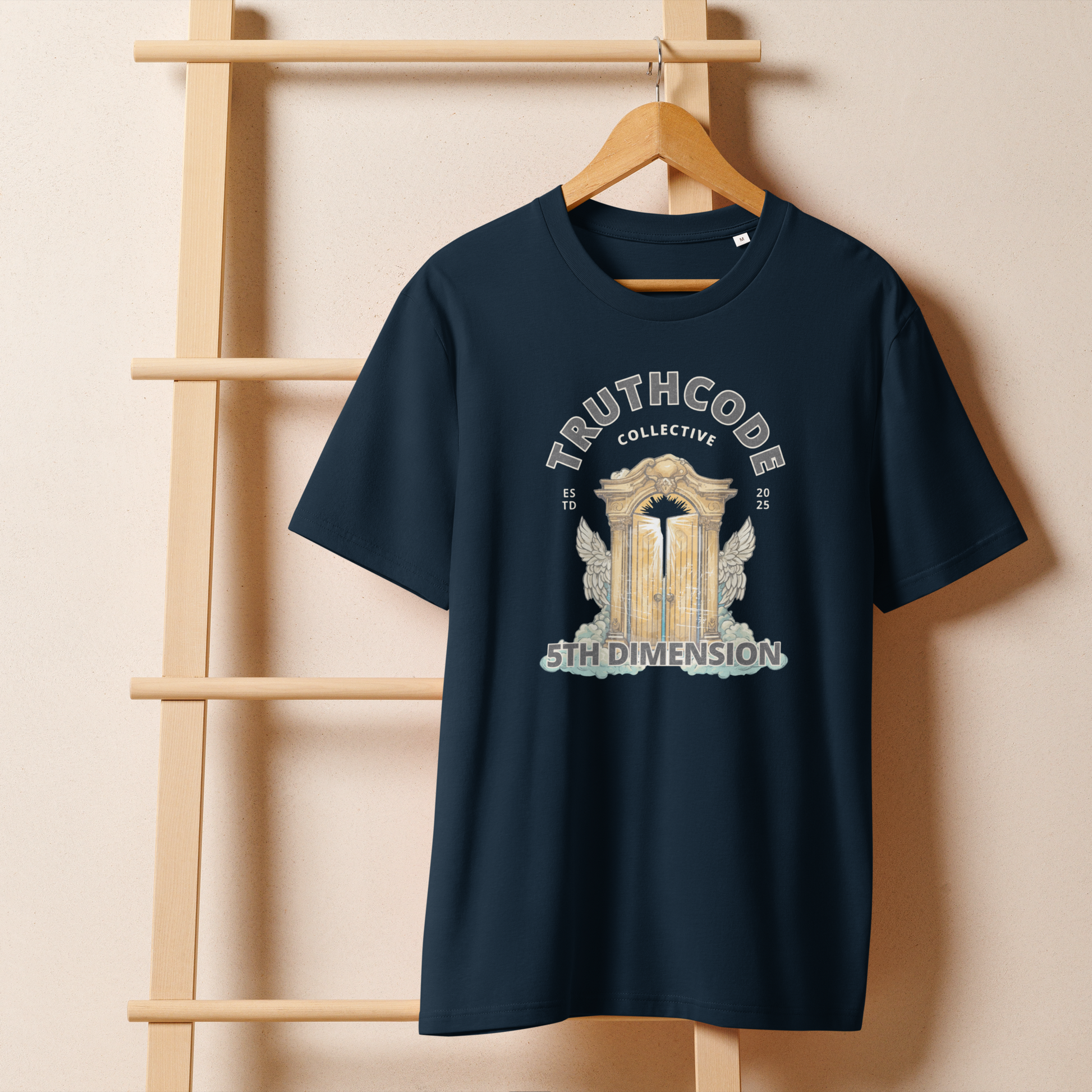 Navy blue organic t-shirt with 'Truthcode Collective' and '5th Dimension' text and heavenly gates type design on a wooden hanger