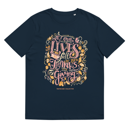 Navy blue organic t-shirt with colorful text design 'Let our lives be full of both thanks and giving' on a white background