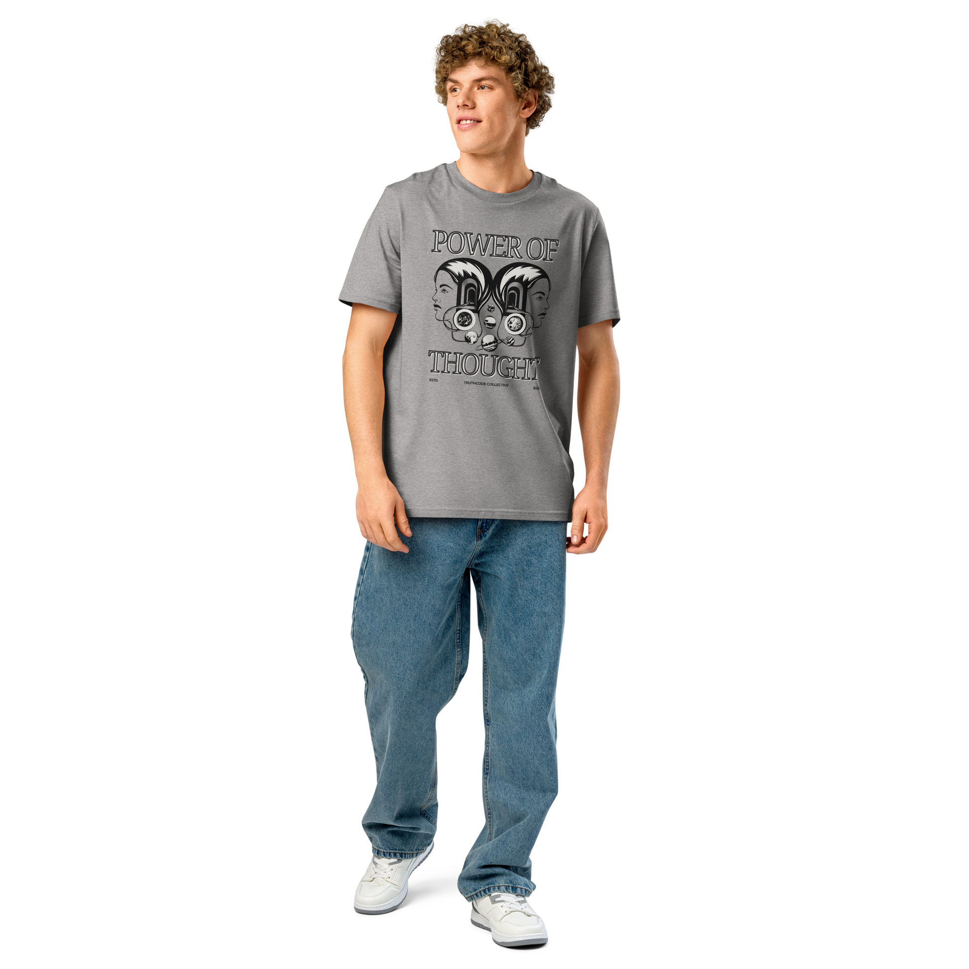 Guy wearing gray organic t-shirt with 'Power of Thought' text and design of graphics of the universe coming from 2 heads on a white background