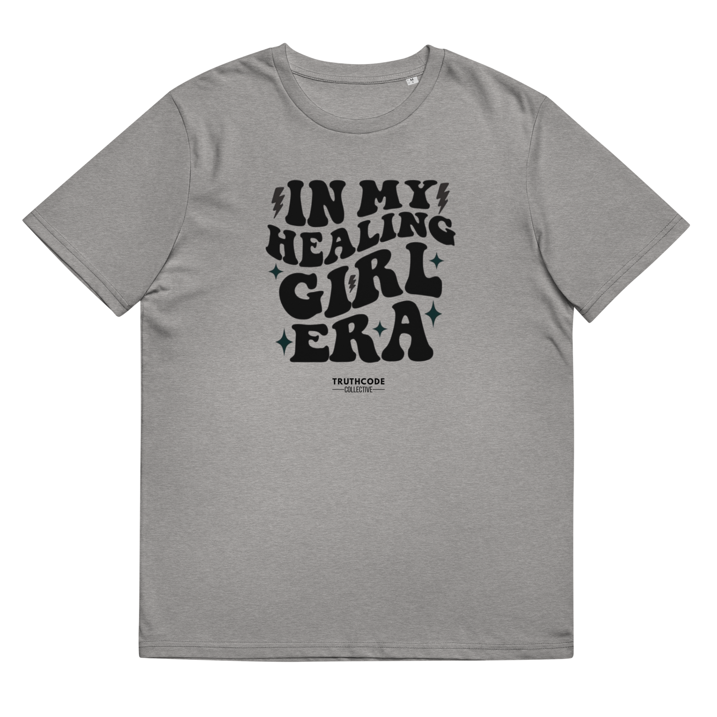 Gray organic t-shirt with black text 'IN MY HEALING GIRL ERA' on a white background