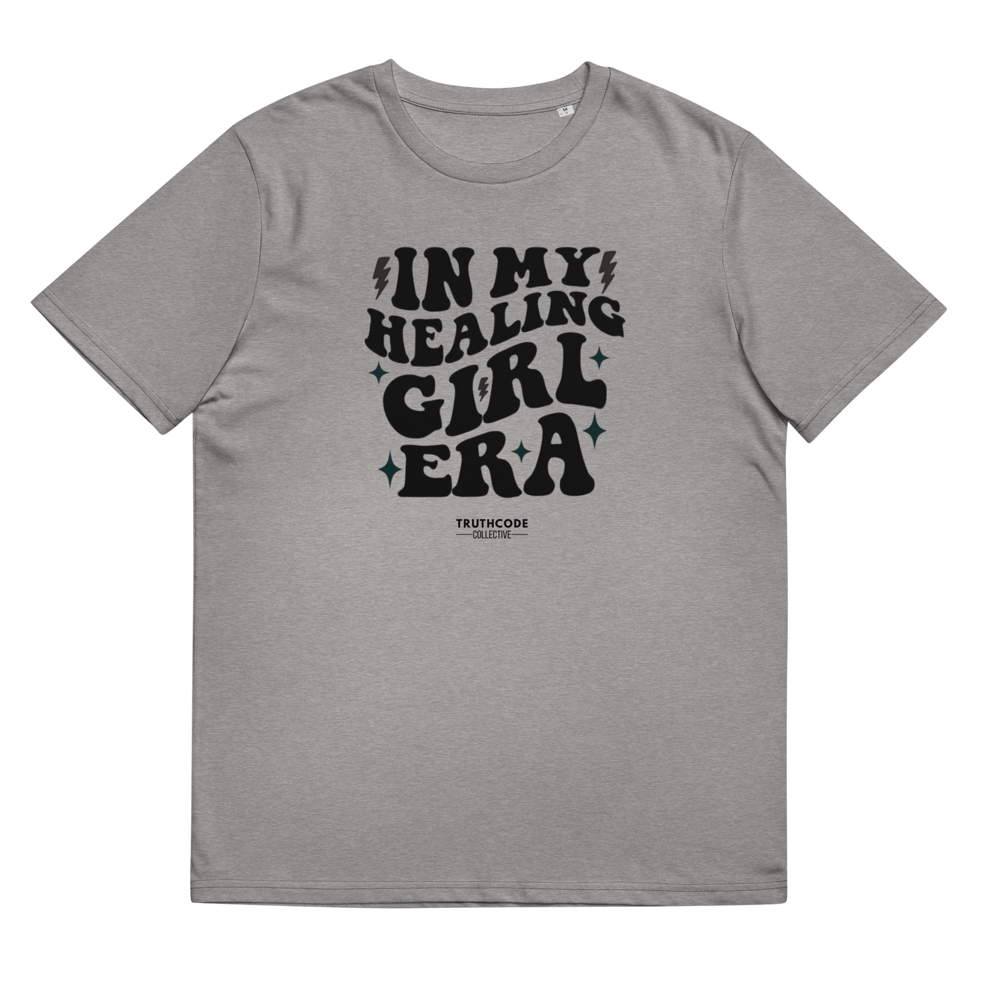 Gray organic t-shirt with black text 'IN MY HEALING GIRL ERA' on a white background