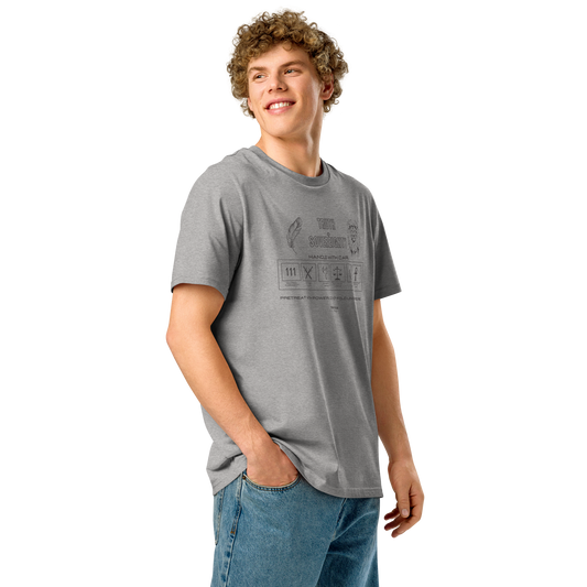 Guy wearing gray organic t-shirt with text 'Truth + Sovereignty'  with symbols and graphics relating to it on a white background