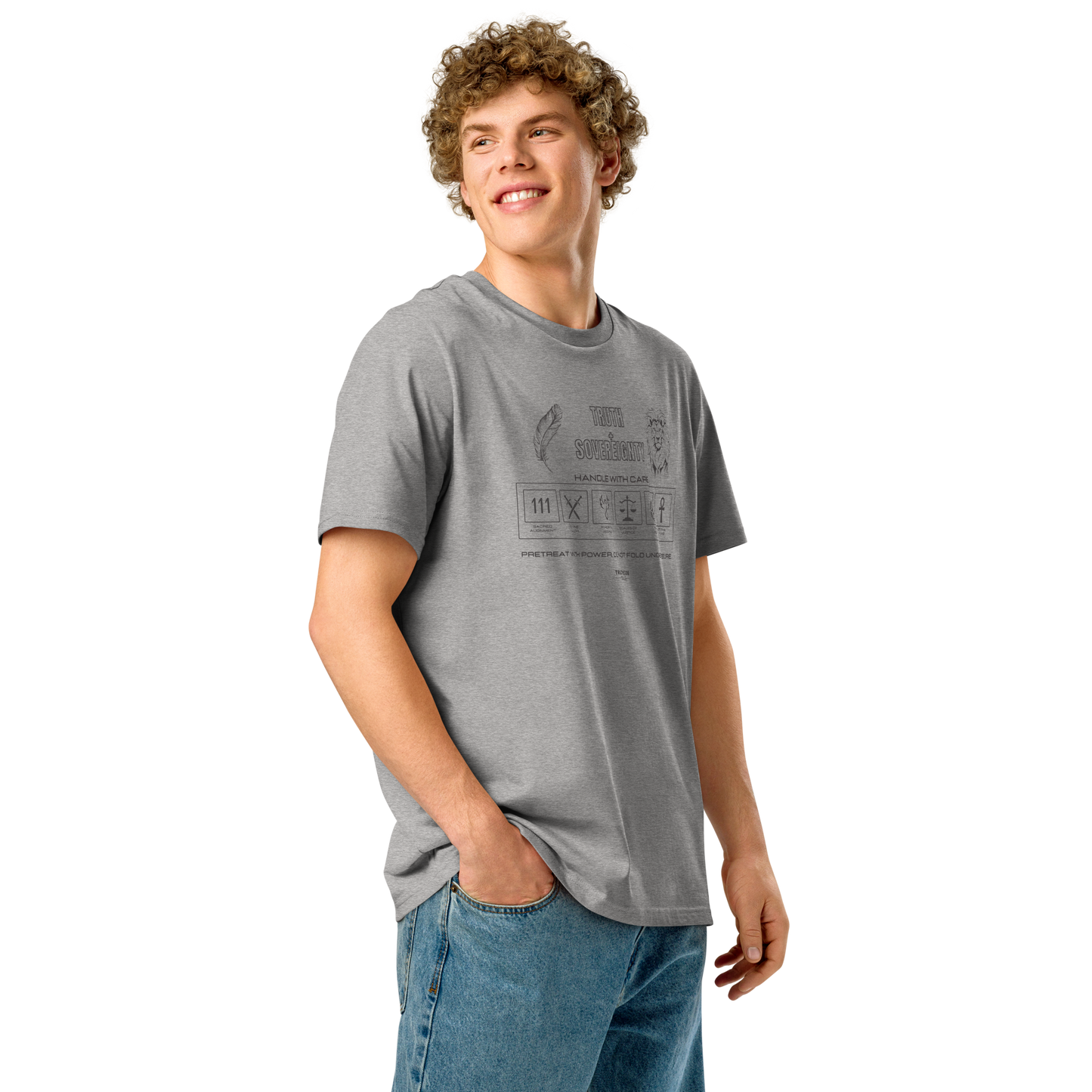 Guy wearing gray organic t-shirt with text 'Truth + Sovereignty' with laundry tag style graphic design symbols relating to the text on a white background
