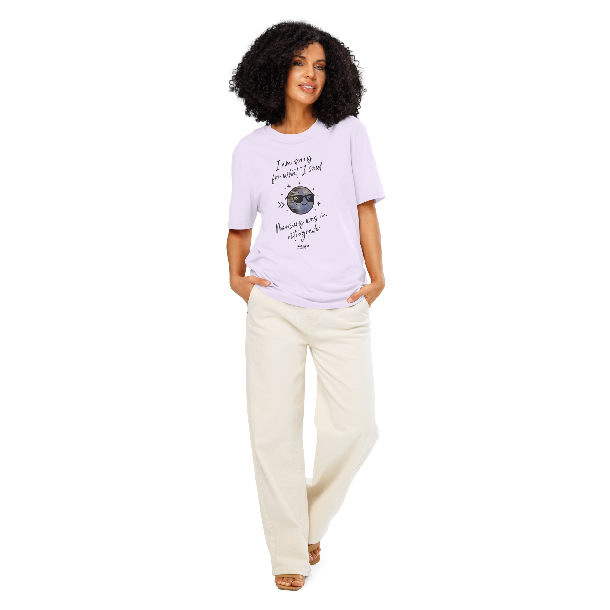 Model wearing lavender organic t-shirt with graphic of a planet wearing sunglasses design and text reading 'I'm sorry for what i said, Mercury was in retrograde' on a white background
