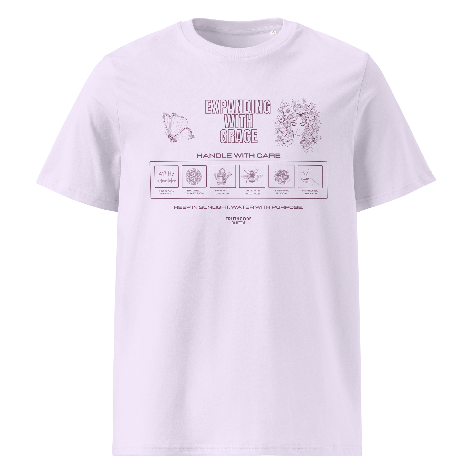 Lavender organic t-shirt with text 'Expanding with grace' with symbols and graphics relating to it on a white background