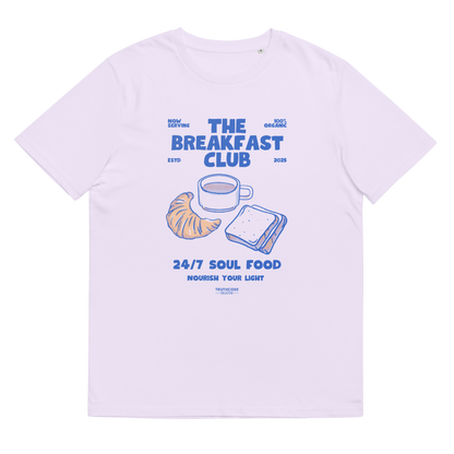 Lavender organic t-shirt with 'The Breakfast Club' graphic design featuring a coffee cup, croissant, and sandwich.