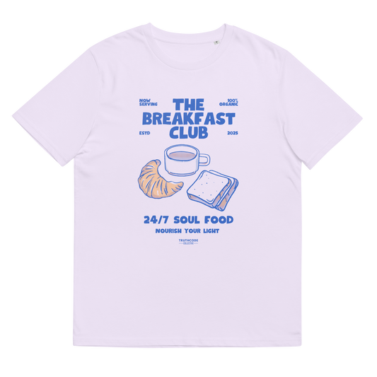 Lavender organic t-shirt with 'The Breakfast Club' graphic design featuring a coffee cup, croissant, and sandwich.