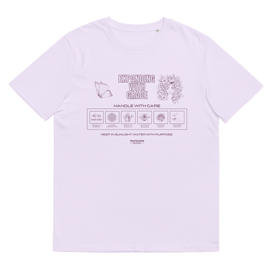Lavender organic t-shirt with text 'Expanding with grace'  and symbols relating to expanding in laundry tag style graphics on a white background