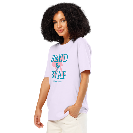 Woman wearing lavender organic t-shirt with 'Bend & Snap' text and football player snapping football silhouette graphic on a white background