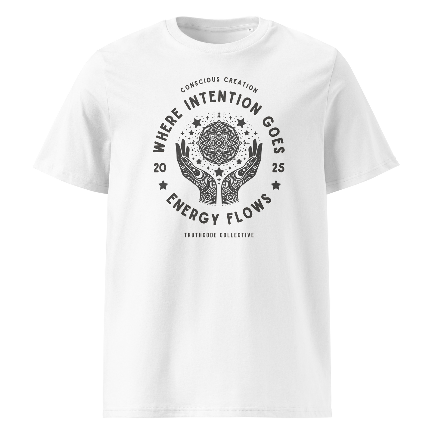 White organic t- shirt with a graphic of hands and stars around a mandala symbol, with text reading 'Where intention goes, energy flows'