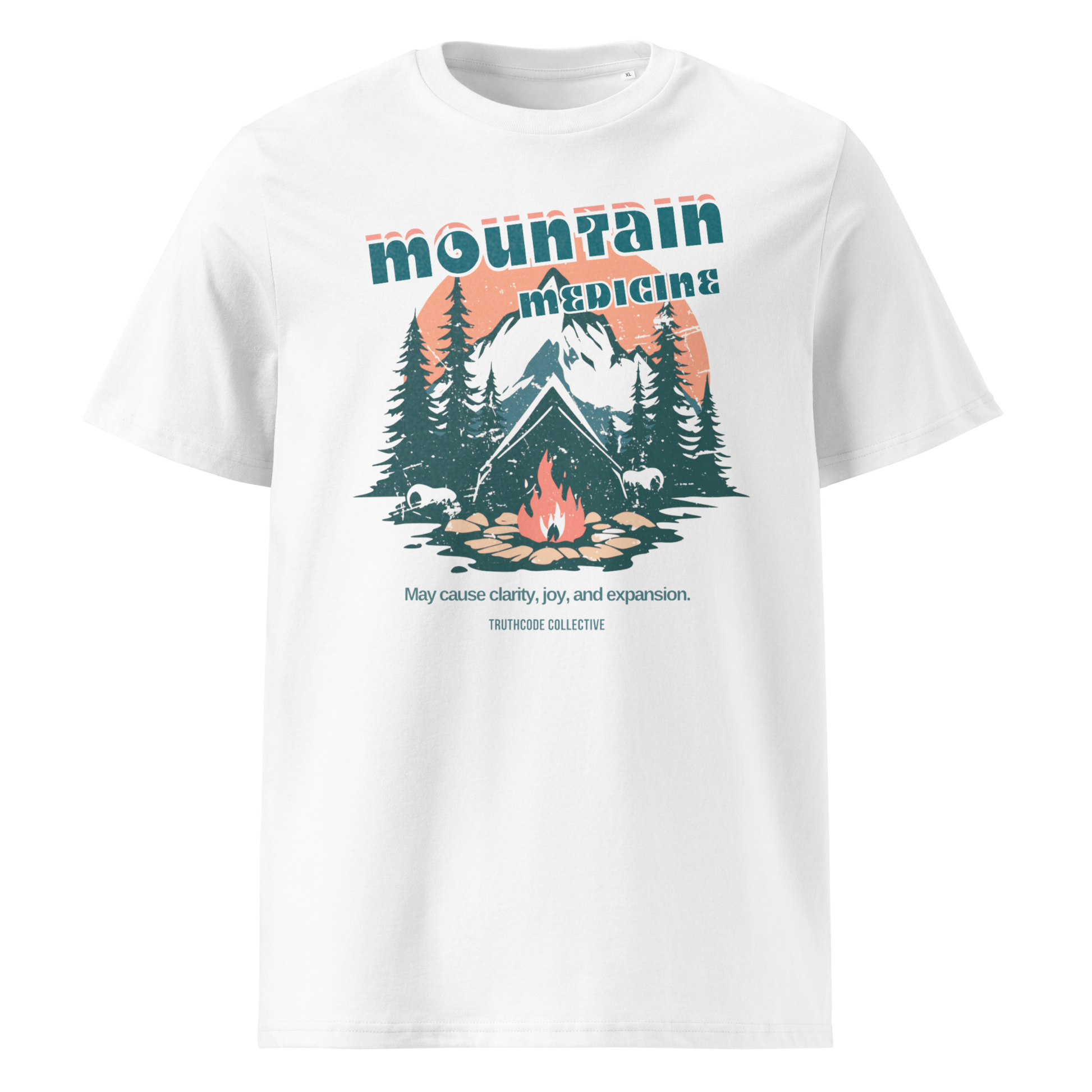 White organic t-shirt with mountain and campfire graphic and 'Mountain Medicine' text on a white background