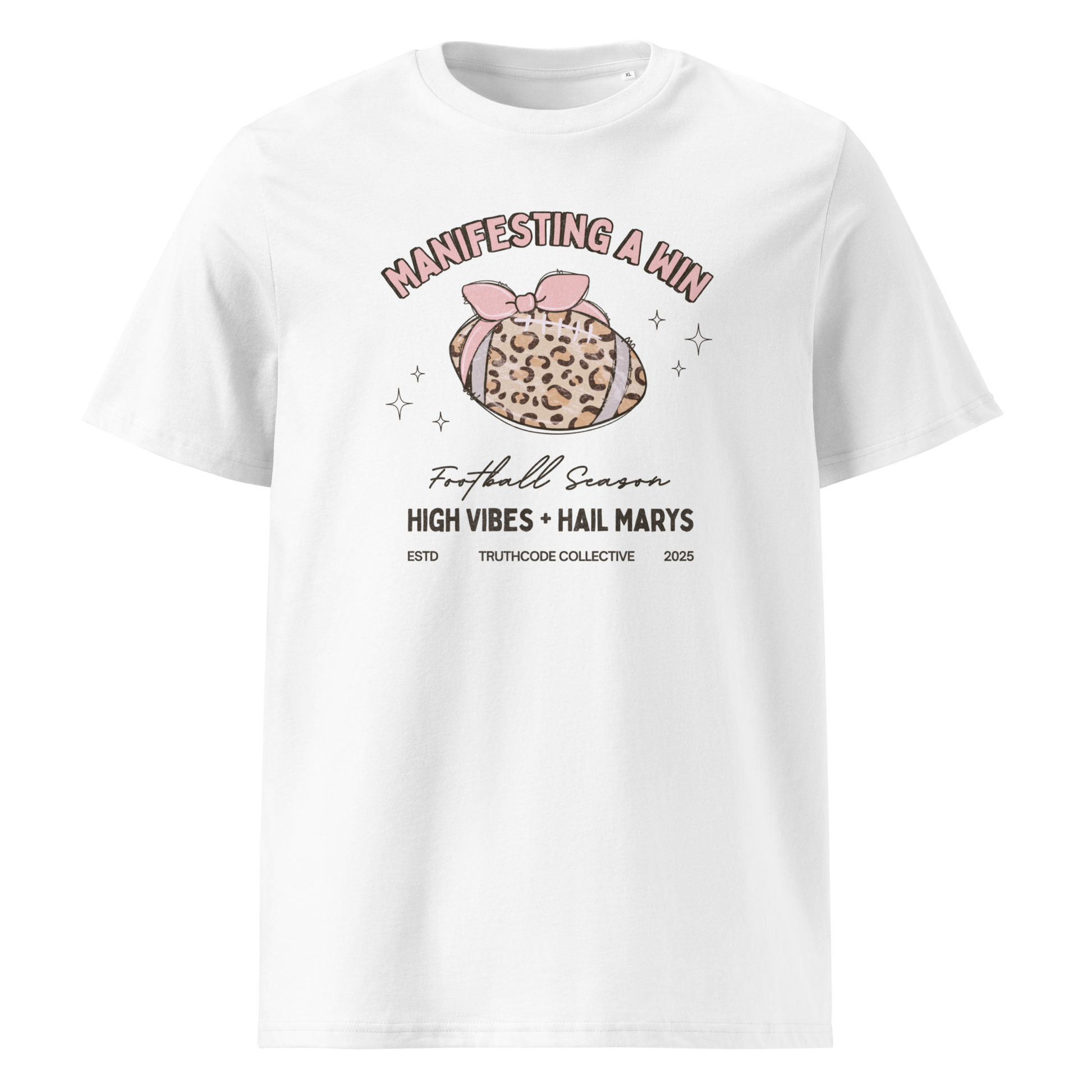 White organic t-shirt with girly football graphic and text 'Manifesting a win' and 'Football season, high vibes and hail marys' on a white background