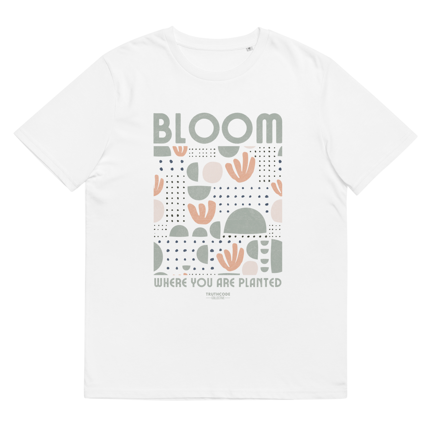 White organic t-shirt with 'Bloom Where You Are Planted' text and graphic design on a white background