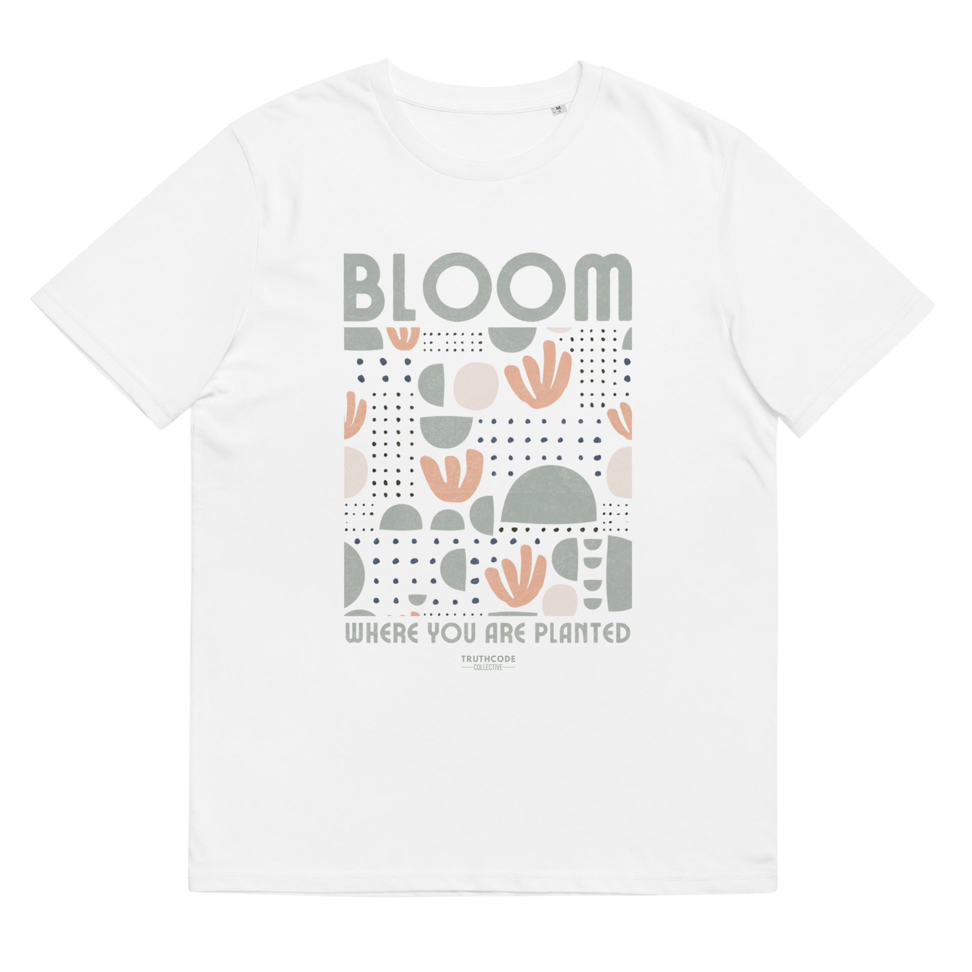 White organic t-shirt with 'Bloom Where You Are Planted' text and graphic design on a white background