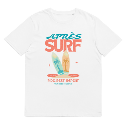 White organic t-shirt with colorful 'Après Surf' design featuring surfboards and palm trees on a white background.