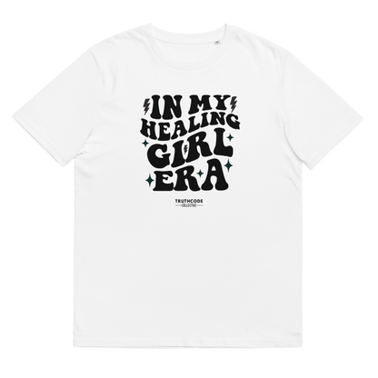 White organic t-shirt with black text 'IN MY HEALING GIRL ERA' on a white background
