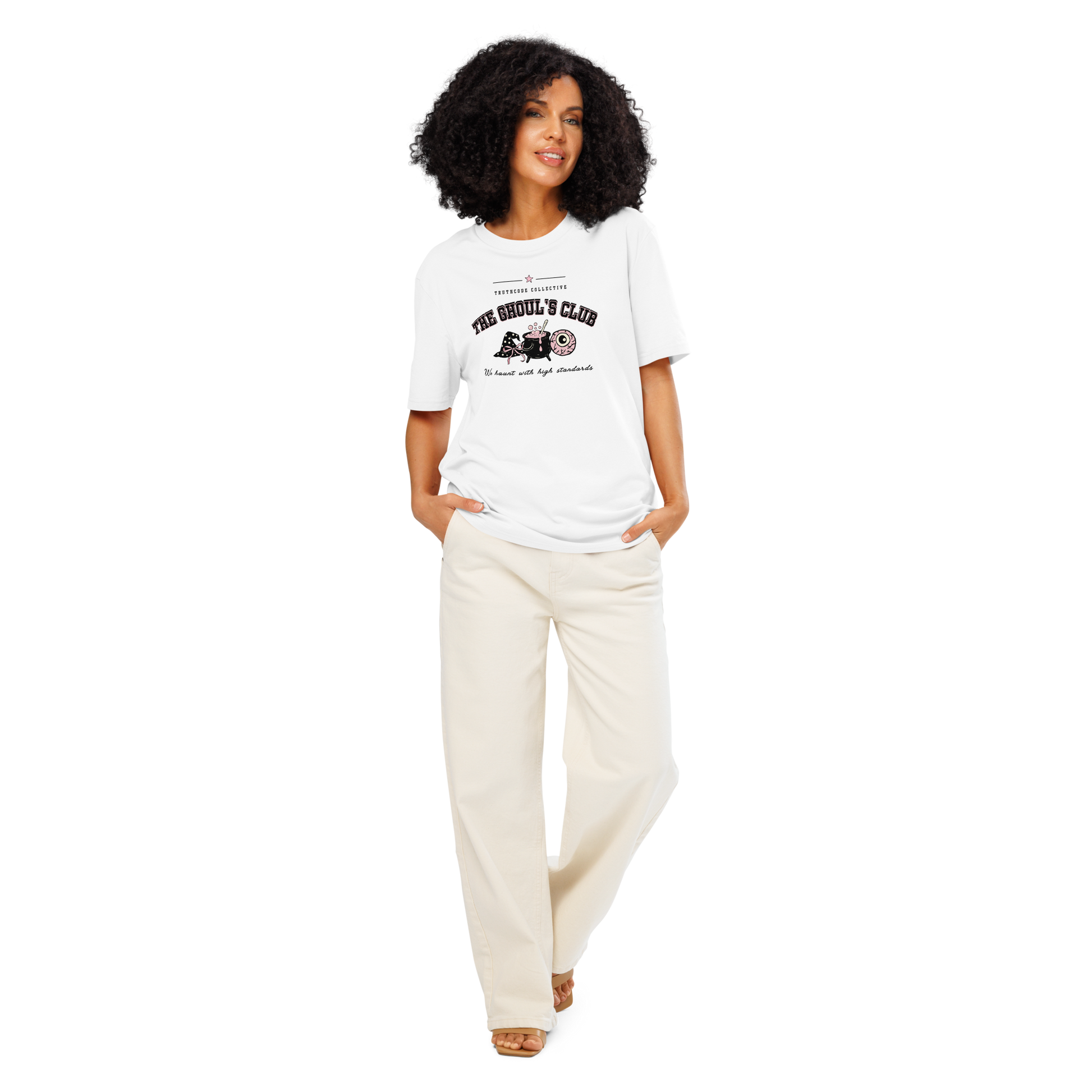 Woman wearing white organic t-shirt with 'The Ghoul's Club' text and cartoon halloween graphic design on a white background
