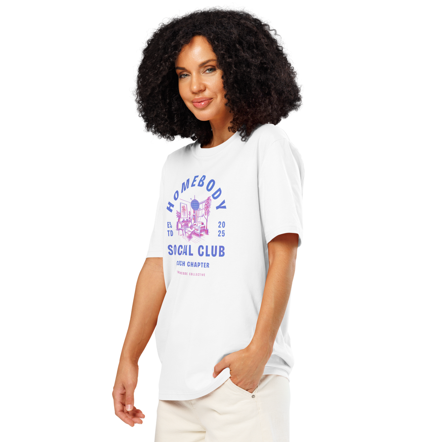 Woman wearing white organic t-shirt with 'Homebody Social Club, couch chapter' and graphic design of a sitting room, on a white background