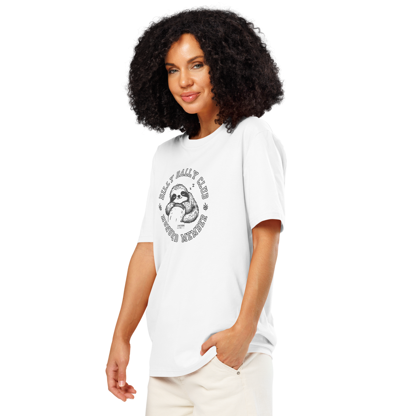 Woman wearing white organic t-shirt with sloth graphic and text 'Dilly dally club, honored member' on a white background