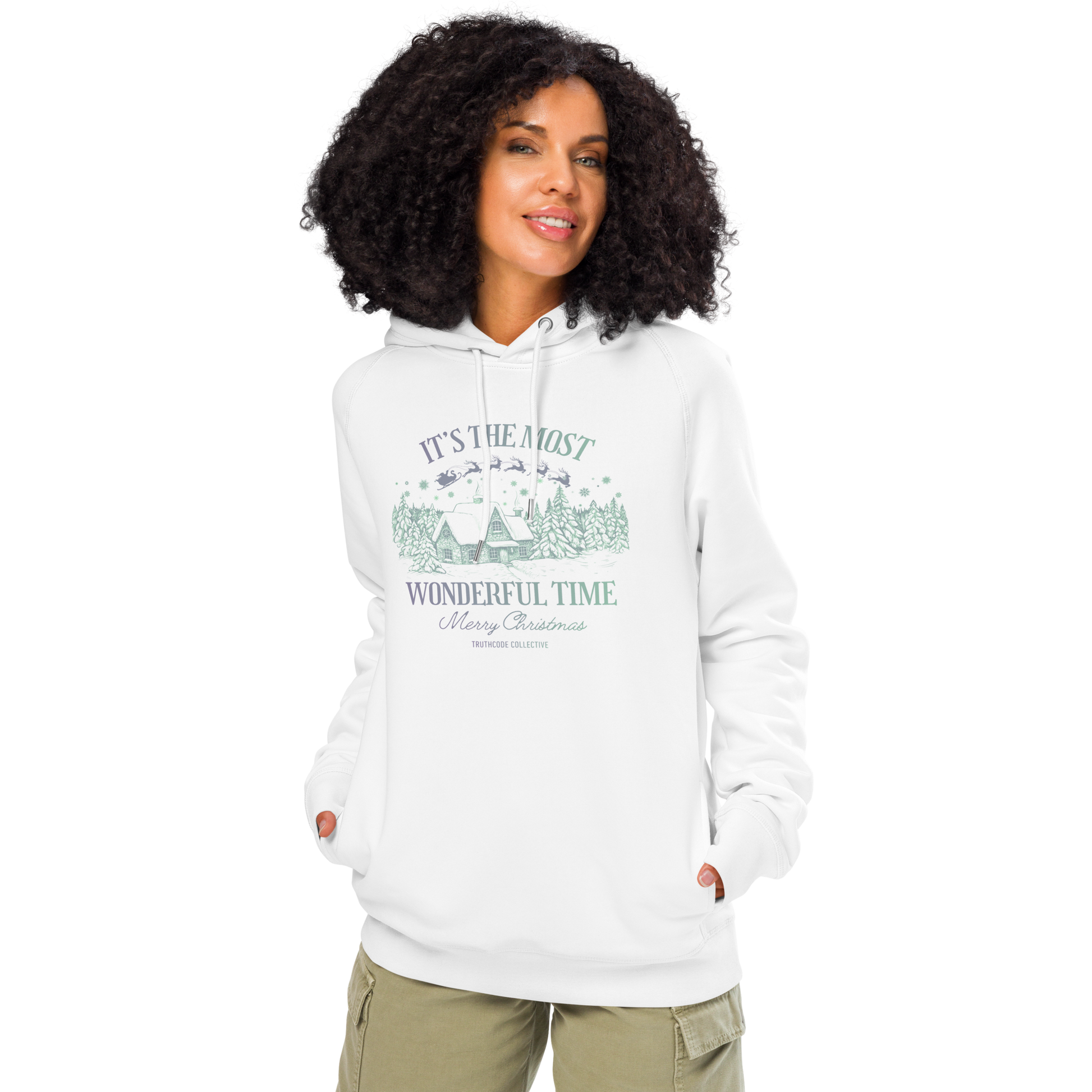 Woman wearing white organic hoodie with Christmas-themed design and text 'It's the most wonderful time of the year' on a white background